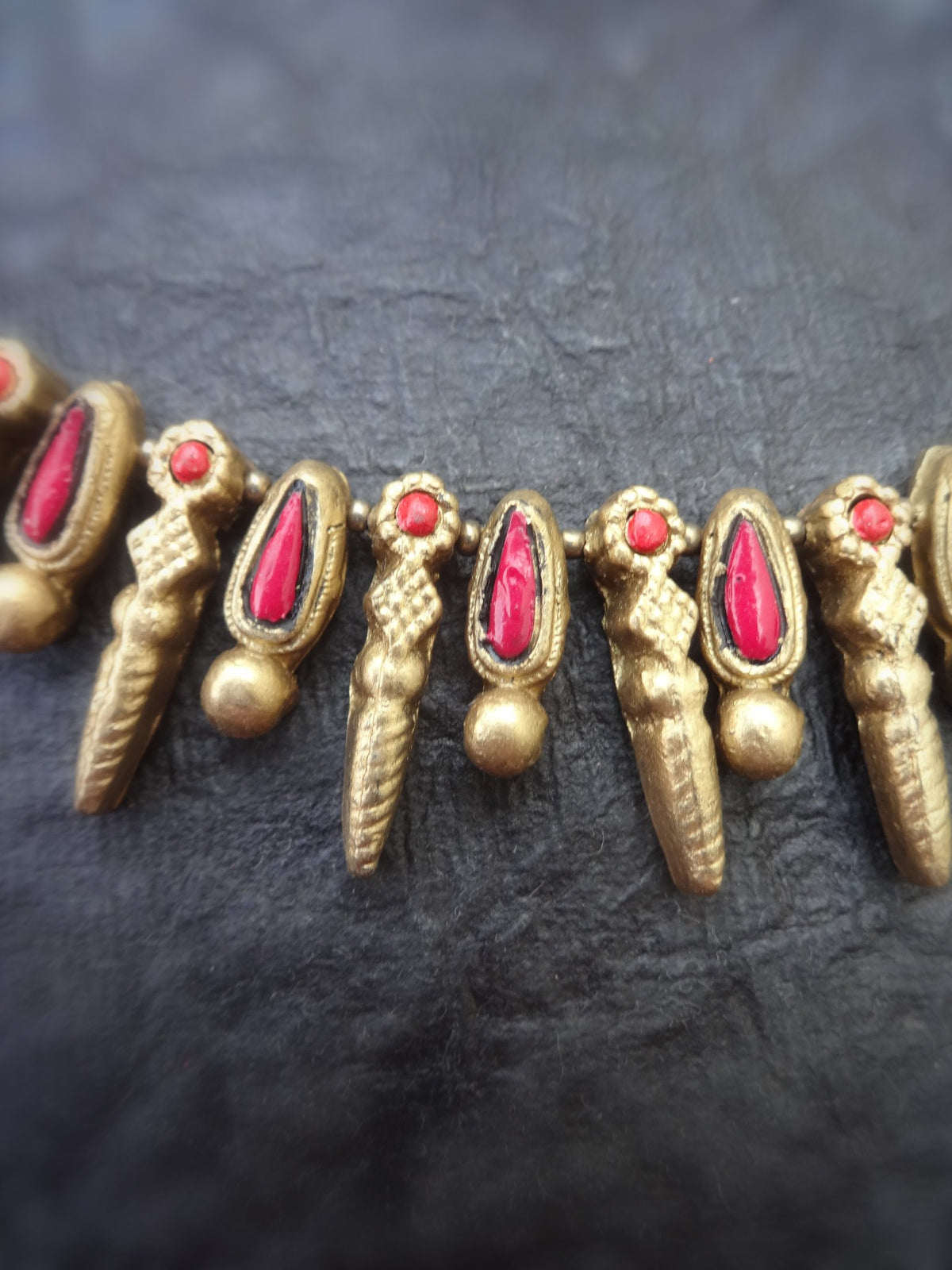 Gowri red and gold terracotta earrings shown separately