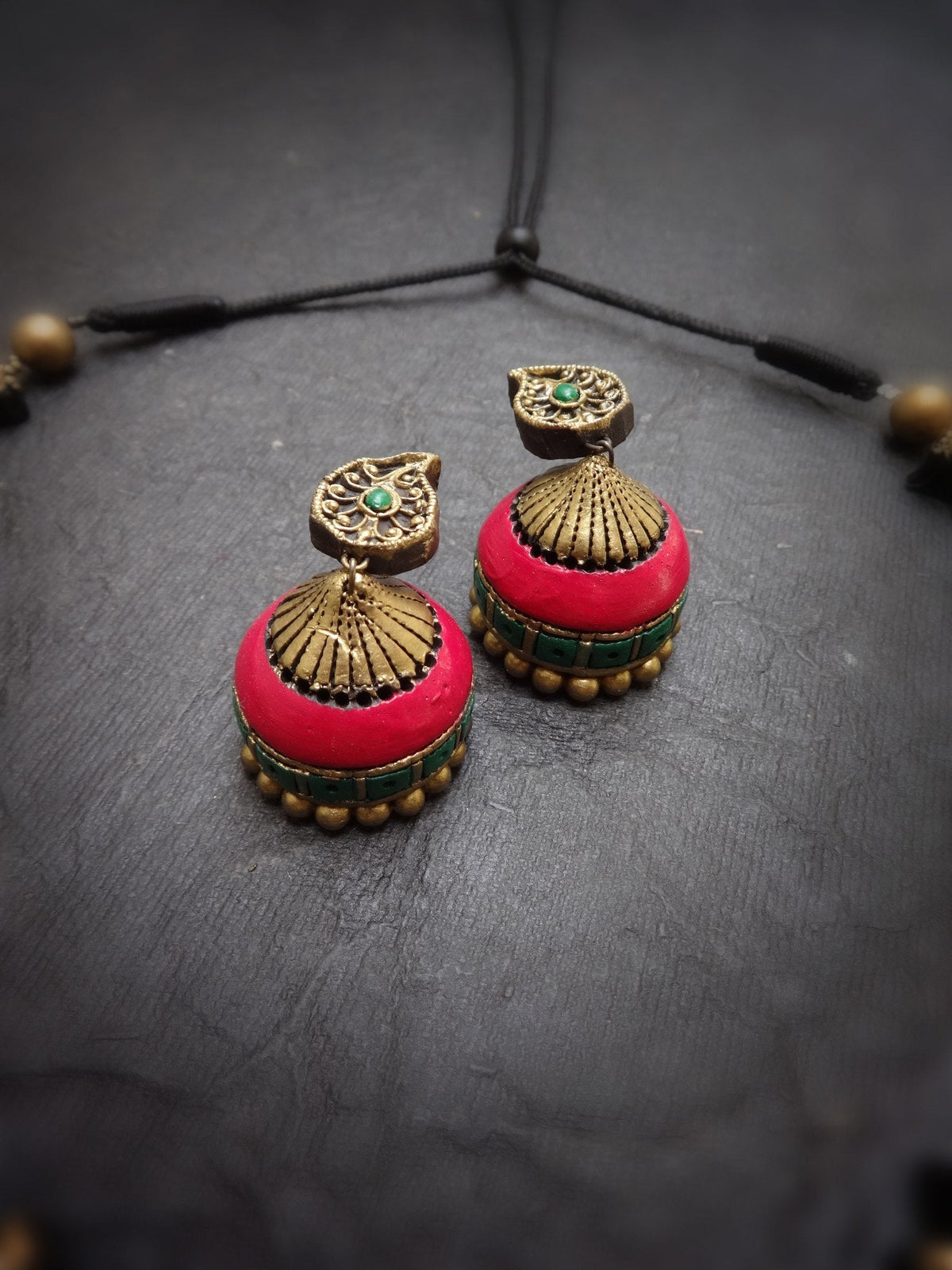 Anbarasi set angle view with red jhumkas