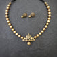Warm antique gold terracotta necklace set with layered gold detail